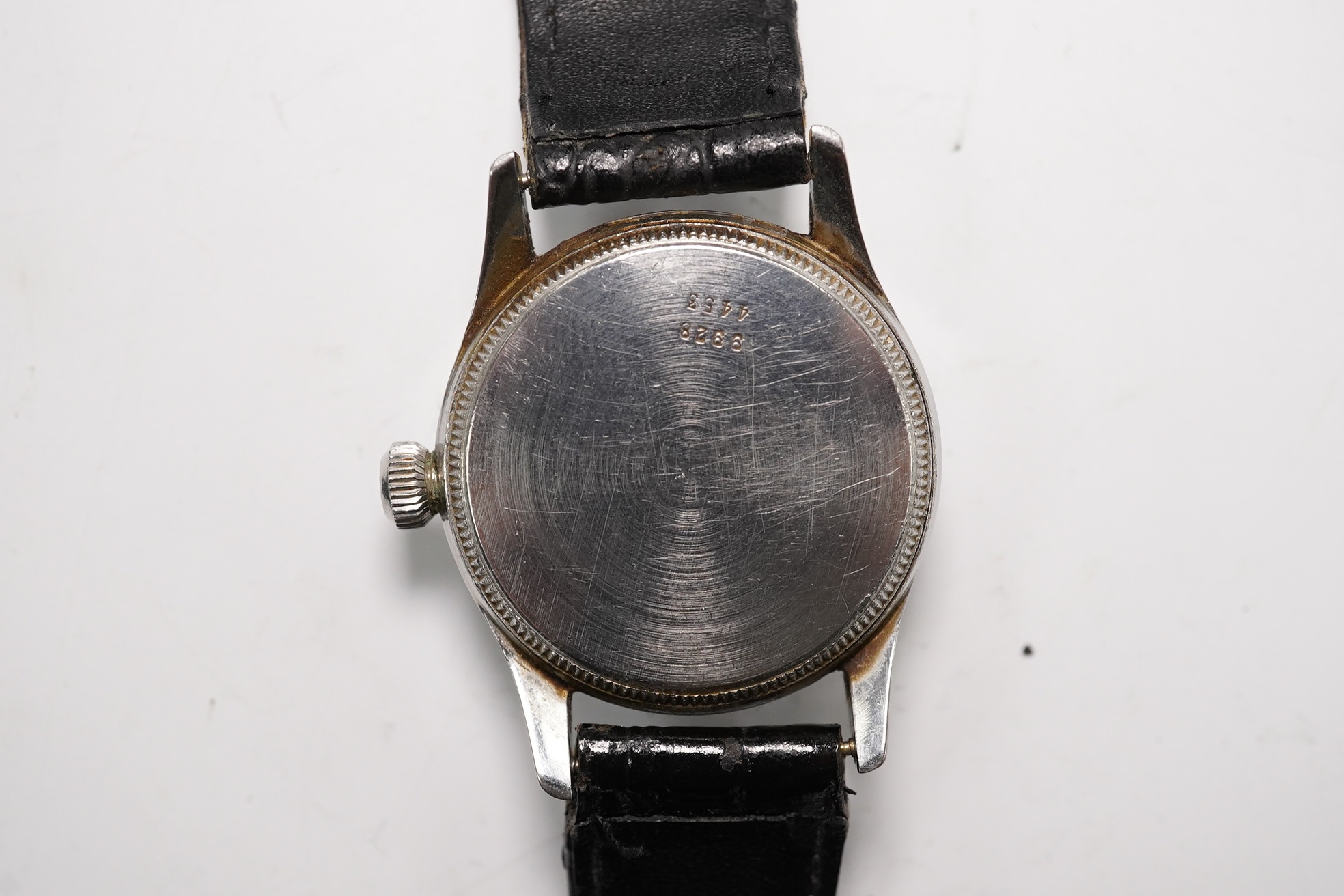 A stainless steel Tudor Oyster manual wind wrist watch, on an associated strap, case diameter 31mm. Condition - poor to fair